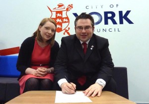 Councillor Linsay Cunningham-Cross and James Alexander, Leader of City of York Council, as he signs the Beyond 2015 declaration.